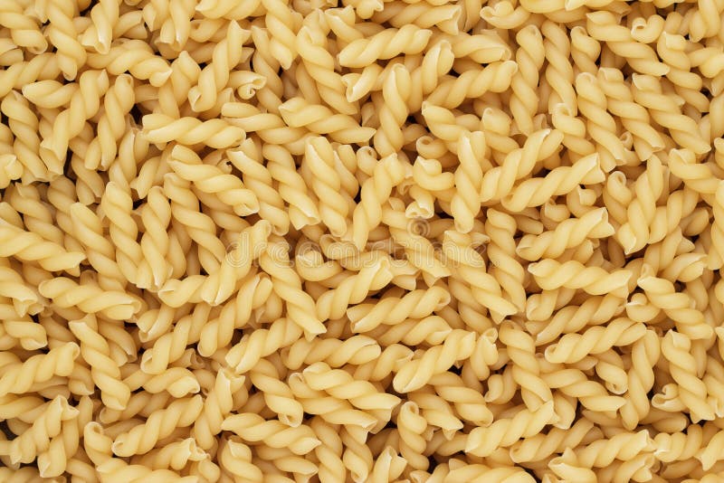 Dry uncooked thick gemelli pasta texture