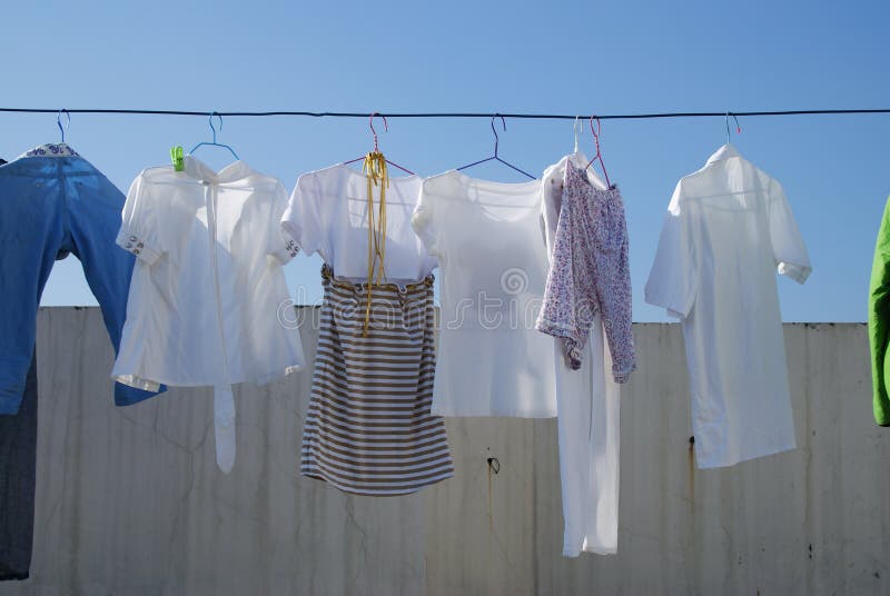 Drying clothes stock image. Image of windy, shirt, green - 9635569