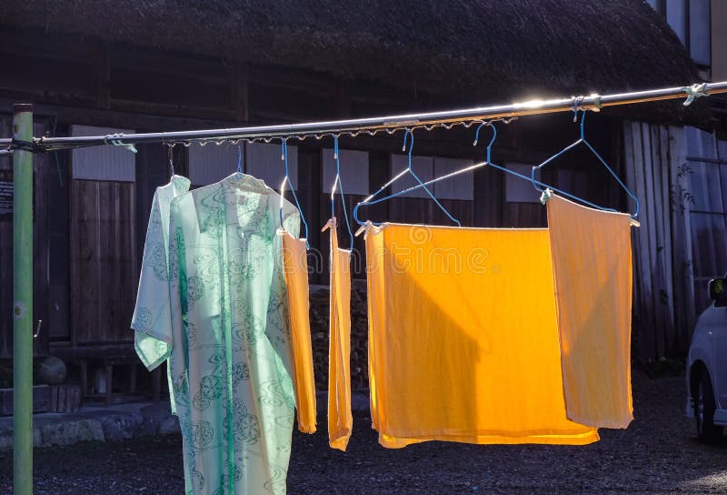 Drying Clothes Under Sun Light Stock Image Image of clothesline