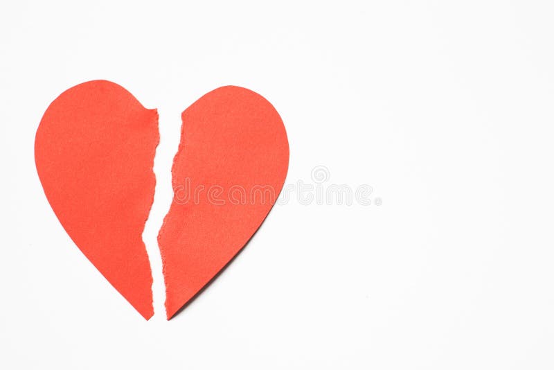 Red Paper Heart Torn In Half Against White Background. Red Paper Heart Torn In Half Against White Background