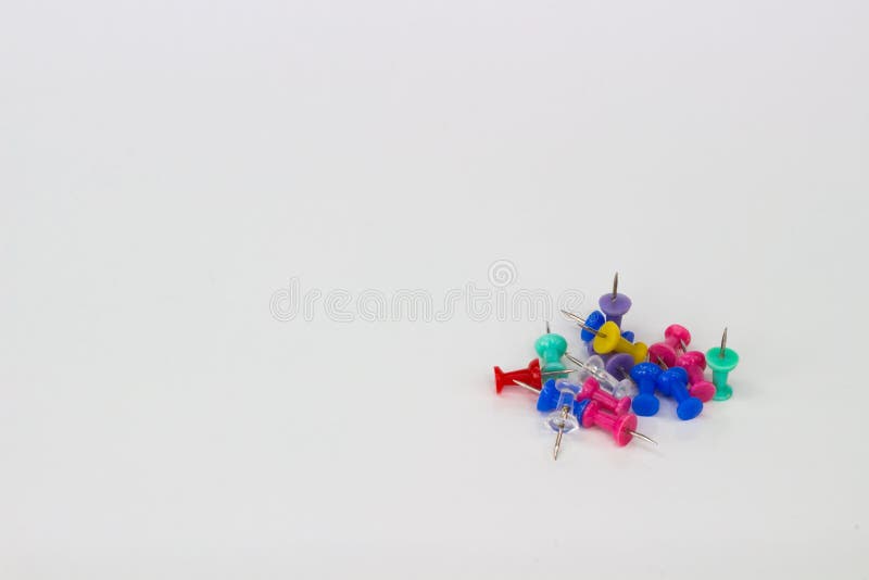 Drücken Sie Stifte vom weißen Hintergrund - niedrigeres Recht stockbild Drücken Sie Stifte vom weißen Hintergrund - niedrigeres Recht stockbild