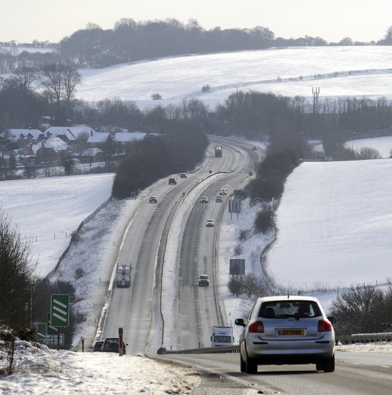 Dual carriageway highway during winter in England UK. A34 trunk road southbound carriageway looking towards East Ilsey close to the Berkshire Oxfordshire border royalty free stock photo Dual carriageway highway during winter in England UK. A34 trunk road southbound carriageway looking towards East Ilsey close to the Berkshire Oxfordshire border royalty free stock photo