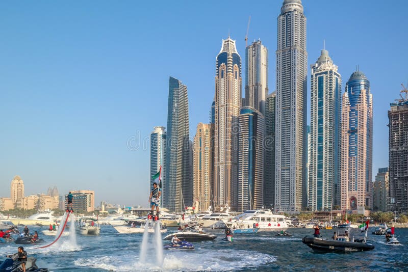 Dubai city fun parachuting and water activities, Tourist attractions at Dubai Marina royalty free stock photography Dubai city fun parachuting and water activities, Tourist attractions at Dubai Marina royalty free stock photography