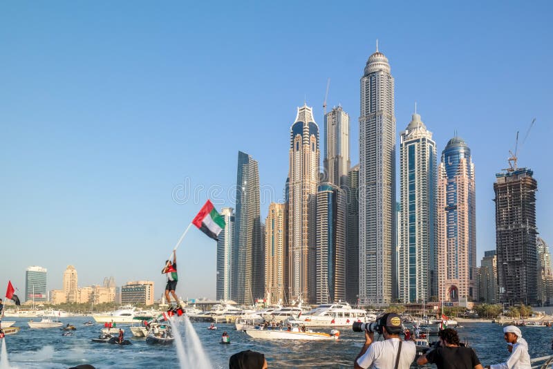 Dubai city fun water activities, Tourist attractions at Dubai Marina, UAE flag stock photo Dubai city fun water activities, Tourist attractions at Dubai Marina, UAE flag stock photo