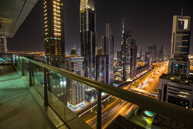 Dubai skyline during night with amazing city center lights and heavy road traffic,UAE. royalty free stock photos Dubai skyline during night with amazing city center lights and heavy road traffic,UAE. royalty free stock photos
