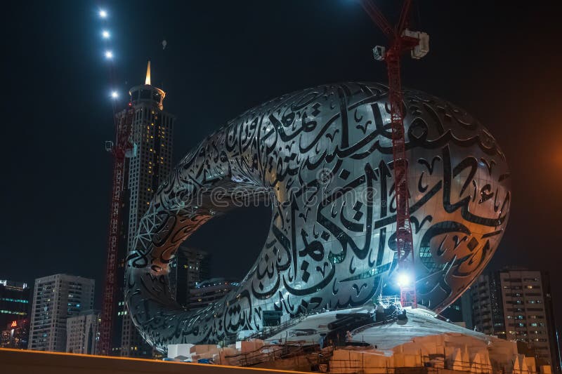 Dubai, UAE - February 2020 : Night view of The Museum Of The Future is visionary cultural institution currently under construction in Dubai, UAE. Museum of Innovation and Design.