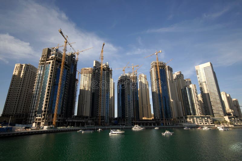 Construction Of Waterfront Buildings In Dubai, United Arab Emirates. Construction Of Waterfront Buildings In Dubai, United Arab Emirates.