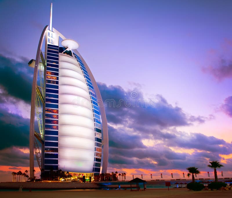 DUBAI, UAE. Burj Al Arab hotel in Dubai. Burj Al Arab is a luxury 5 stars hotel built on an artificial island in front of Jumeirah beach. Sunset View. DUBAI, UAE. Burj Al Arab hotel in Dubai. Burj Al Arab is a luxury 5 stars hotel built on an artificial island in front of Jumeirah beach. Sunset View