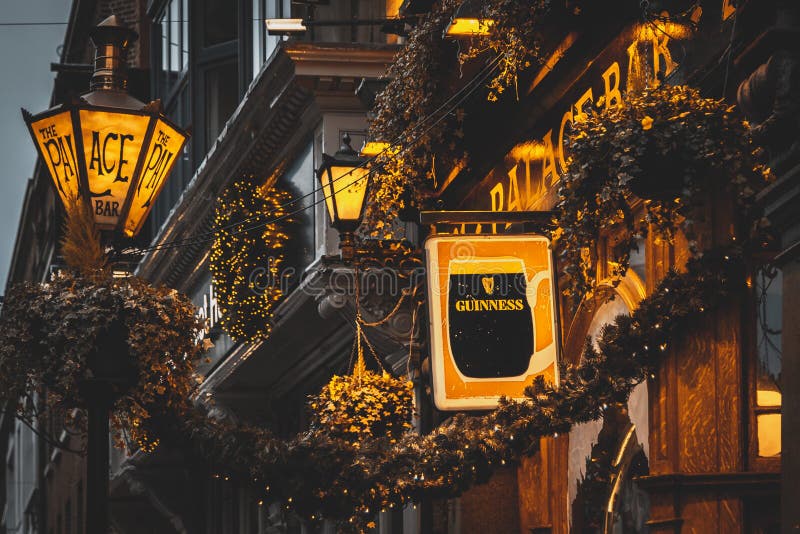 DUBLIN, IRELAND, DECEMBER 24, 2018: Close up of the exterior of the Palace Bar, decorated for Christmas on Fleet Street, with a