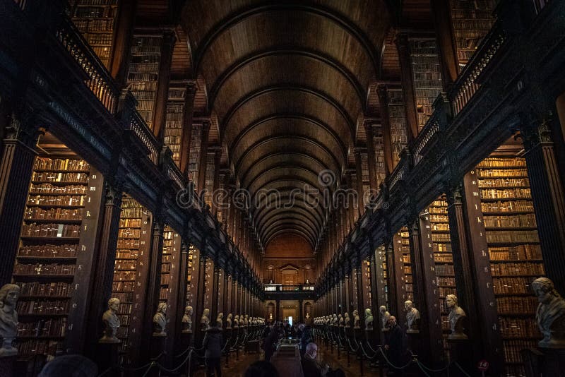 DUBLIN, IRELAND, DECEMBER 21, 2018: The Long Room in the Trinity College Library, home to The Book of Kells. Perspective view of