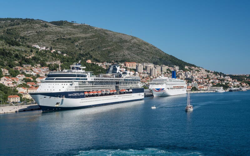 Dubrovnik, Croatia - 22 May 2019: Celebrity Constellation cruise ship with P and O Oriana docked in the Dubrovnik cruise. Dubrovnik, Croatia - 22 May 2019: Celebrity Constellation cruise ship with P and O Oriana docked in the Dubrovnik cruise