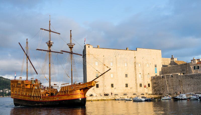 DUBROVNIK / CROATIA - 05012019: Vintage style touristic boat at the Old Port marina in Dubrovnik stock image DUBROVNIK / CROATIA - 05012019: Vintage style touristic boat at the Old Port marina in Dubrovnik stock image