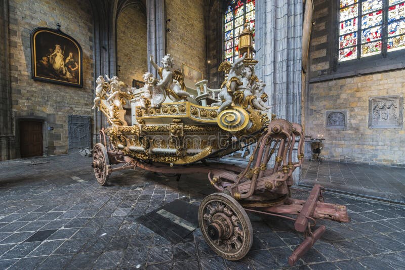 Ducasse de Mons or Doudou in Mons, Belgium. MONS, BELGIUM - JUNE 13, 2014: Waltrude’s Shrine Procession within The Ducasse de Mons (Doudou) celebrations royalty free stock photo Ducasse de Mons or Doudou in Mons, Belgium. MONS, BELGIUM - JUNE 13, 2014: Waltrude’s Shrine Procession within The Ducasse de Mons (Doudou) celebrations royalty free stock photo