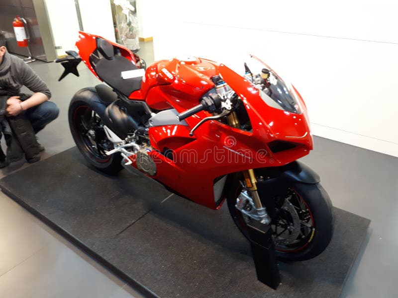 Ducati motorcycle store editorial image. Image of dress 114356500