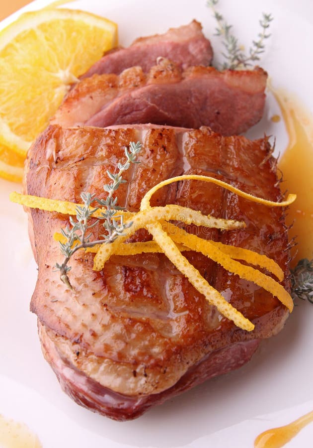 Duck breast and orange sauce royalty free stock photos