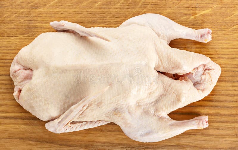 Duck carcass on a chopping Board. Raw farm duck, ready to cook. royalty free stock photography Duck carcass on a chopping Board. Raw farm duck, ready to cook. royalty free stock photography