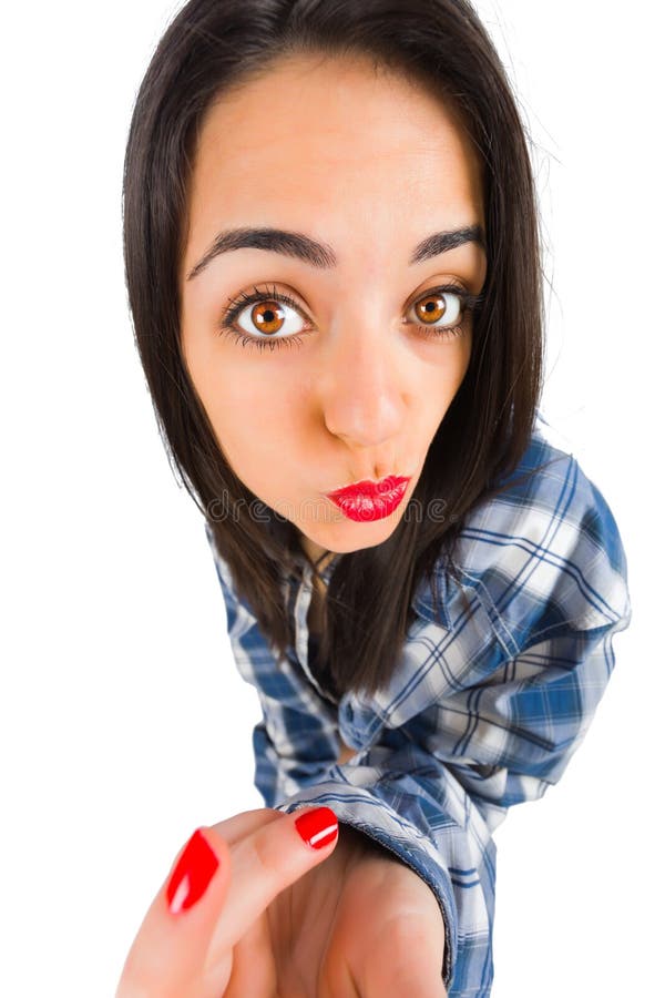 Beautiful girl making duckface while taking a selfie. Beautiful girl making duckface while taking a selfie.