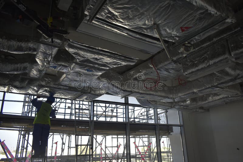 Ducting Work. Duct Insulation. HVAC System in the Construction Site