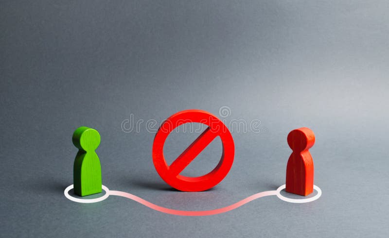 Due figure umane formano un collegamento intorno al rosso NESSUN segno Escludendo le proibizioni e le barriere, facenti affare Sa fotografia stock libera da diritti Due figure umane formano un collegamento intorno al rosso NESSUN segno Escludendo le proibizioni e le barriere, facenti affare Sa fotografia stock libera da diritti