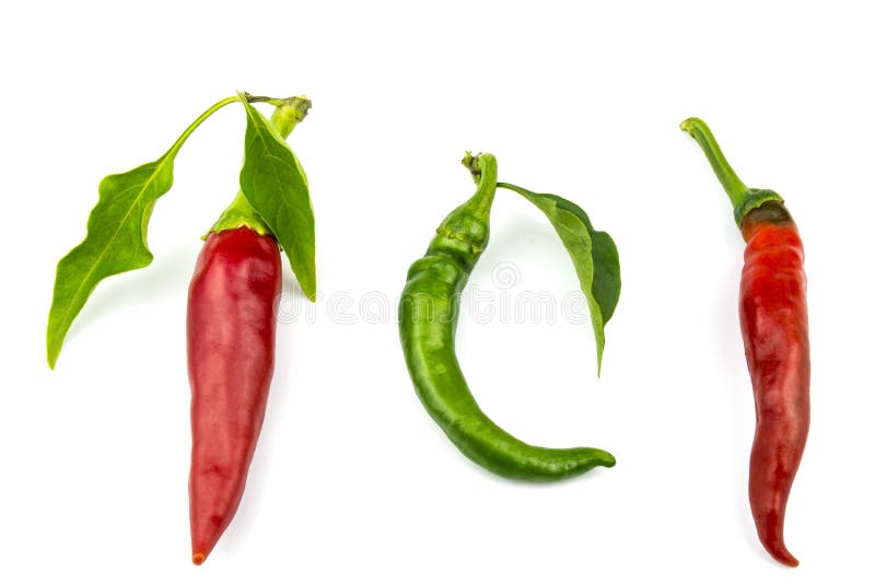 Due peperoncini roventi ed uno piegati isolato su un fondo bianco fotografia stock libera da diritti Due peperoncini roventi ed uno piegati isolato su un fondo bianco fotografia stock libera da diritti