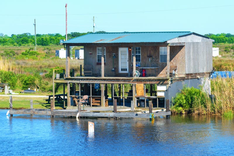 A hunting and fishing camp on a bayou in South Louisiana. A hunting and fishing camp on a bayou in South Louisiana.