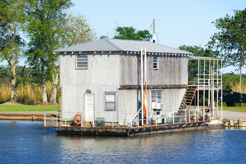 A hunting and fishing camp on a bayou in South Louisiana. A hunting and fishing camp on a bayou in South Louisiana.