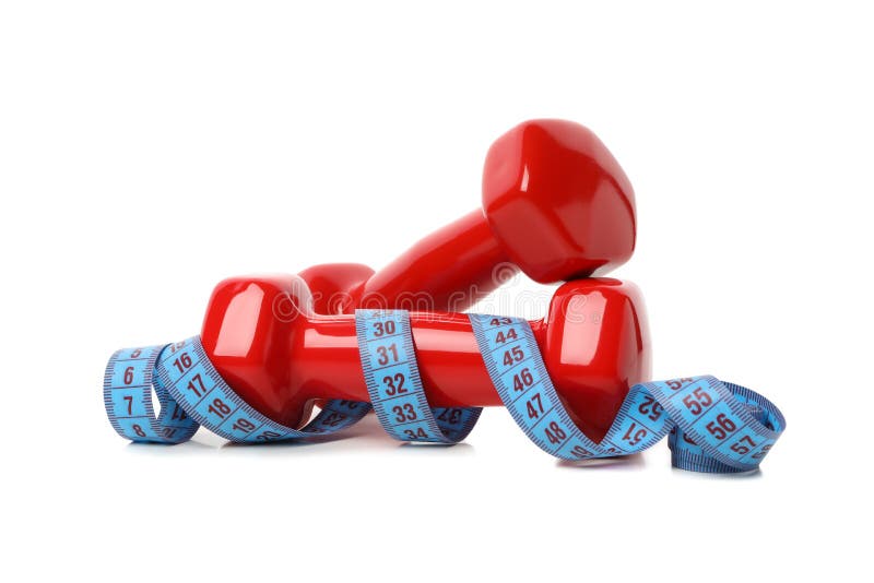 Dumbbells and measuring tape isolated on background, weight loss stock image Dumbbells and measuring tape isolated on background, weight loss stock image