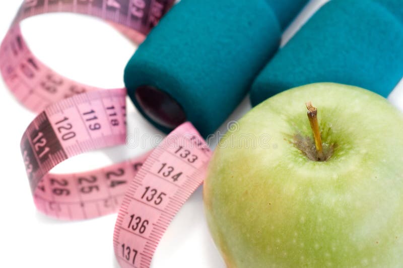 Dumbells, apple and measuring