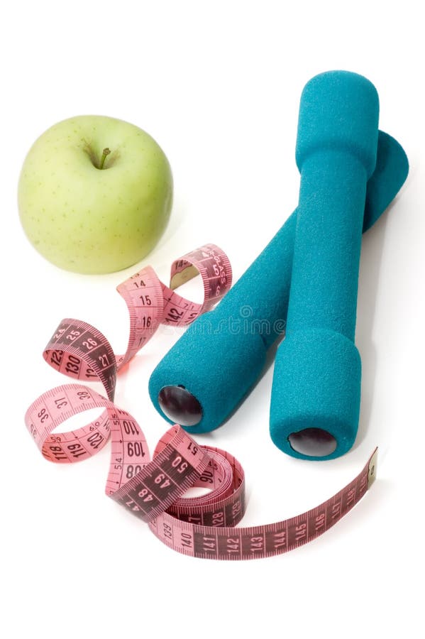 Dumbells, apple and measuring