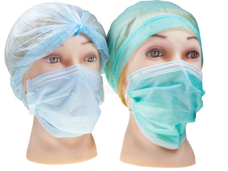 Dummy Doctor Heads Wearing Textile Surgical Cap and Mask Stock Image