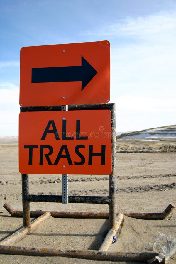 Dump Sign All Trash. This is an orange sign you might see at your local dump that reads All Trash this way. Could be used for environmental concerns, business stock photography Dump Sign All Trash. This is an orange sign you might see at your local dump that reads All Trash this way. Could be used for environmental concerns, business stock photography