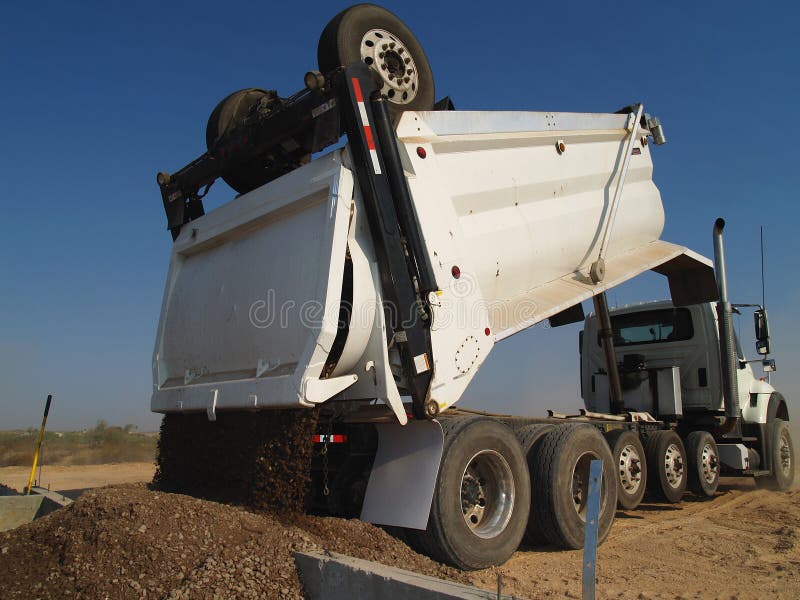 Dump Truck Dumping Dirt Horizontal Picture. Image 5985051