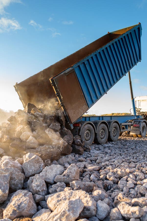 Dump Truck Unloading Its Cargo on a Construction Site Editorial Photo Image of aviation