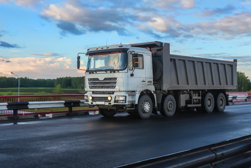 Dump Truck Moves on a Bridge Stock Photo Image of dump, clouds 164622890