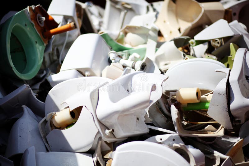 Dumped ceramic toilets stock image. Image of object, trash 33335383