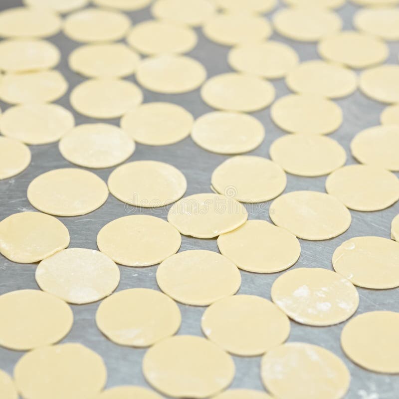 Dumplings, Cooking Process. Rolling Raw Dough Pieces, Perfectly Even