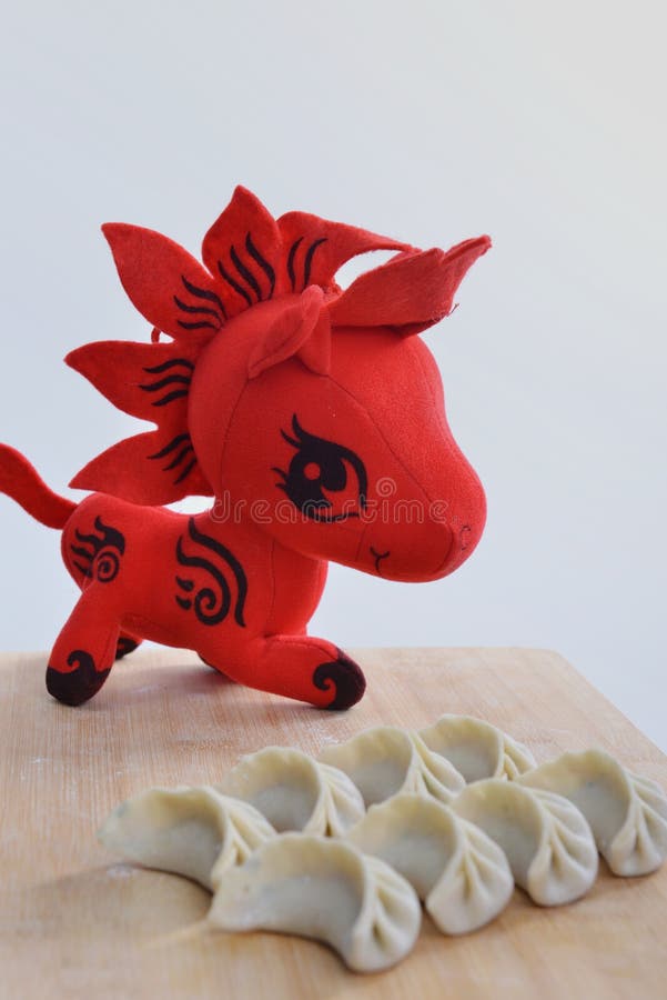 Dumplings and red horse stock photo. Image of festival 36835030