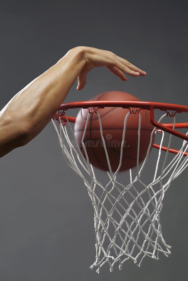 Man Dunking the Basketball stock photo. Image of ball 10103192