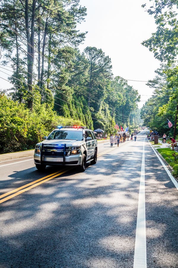 Dunwoody Police Leading July Fourth Parade Editorial Photography