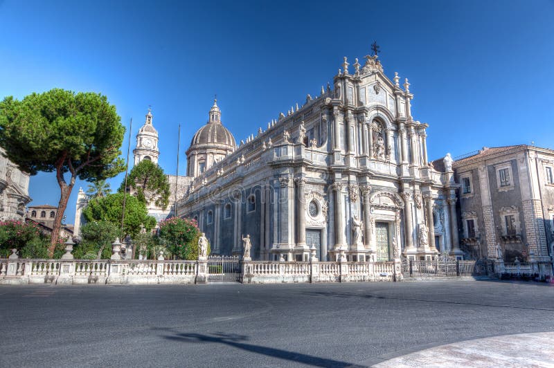 The baroque duomo or cathedral Church of Catania, Sicily, Italy in the early morning. The baroque duomo or cathedral Church of Catania, Sicily, Italy in the early morning