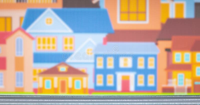 Durée d'un groupe de voitures de jouets soignée se déplaçant sur un modèle de route avec un groupe de maisons colorées de bande de banque de vidéos
