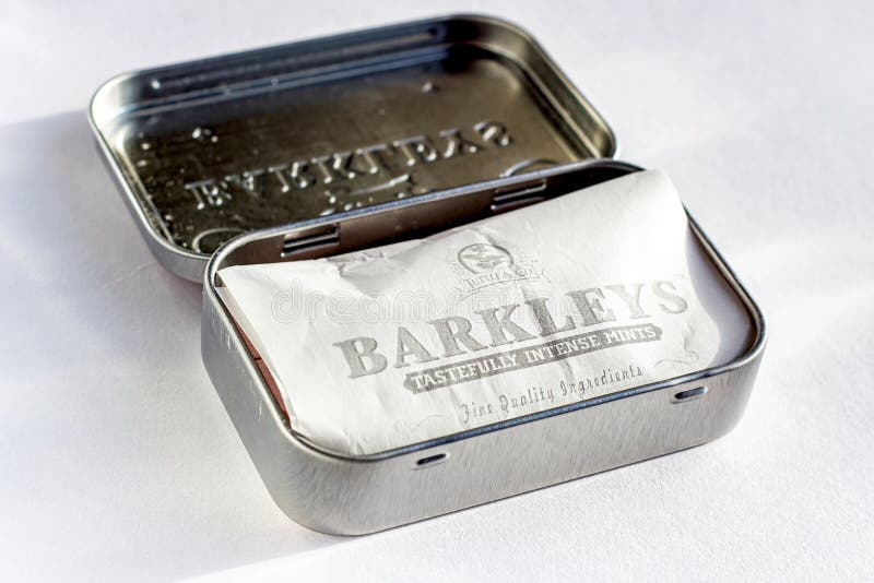 Barkleys tastefully intense mints with cinnamon flavour metal package box on white background stock photos Barkleys tastefully intense mints with cinnamon flavour metal package box on white background stock photos