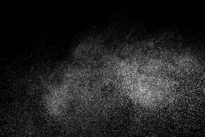 Dust Explosion on a Black Background for Graphic Resources. Stock Image