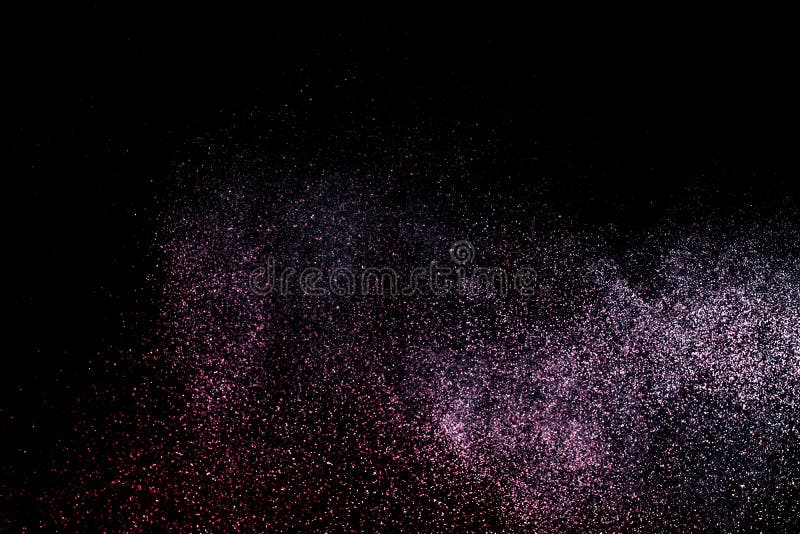 Dust Explosion on a Black Background for Graphic Resources. Stock Image