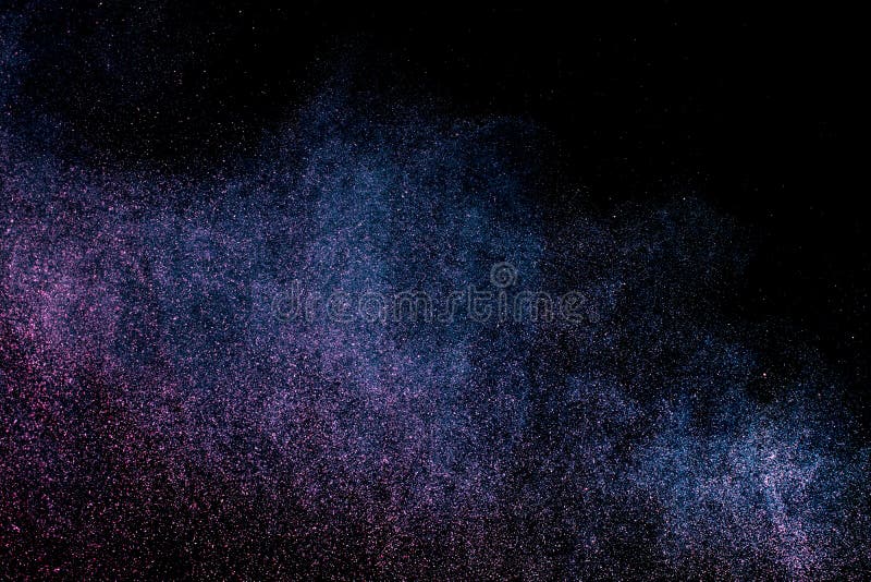 Dust Explosion on a Black Background for Graphic Resources. Stock Photo