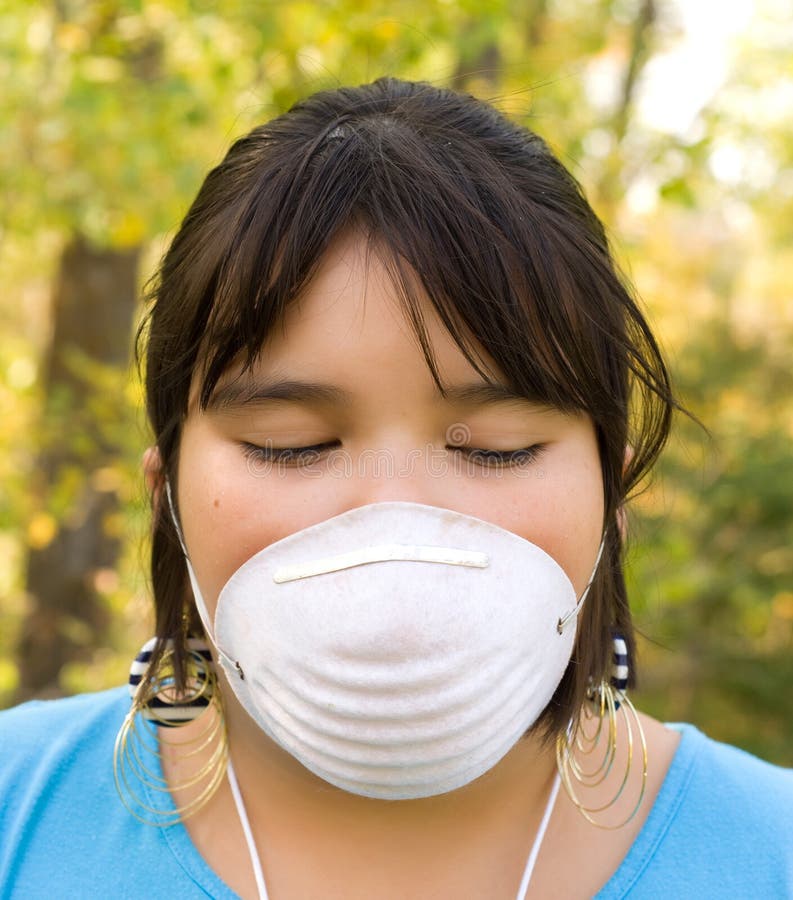 Portrait Of Woman Worker Wearing Dust Mask At Construction Site Stock