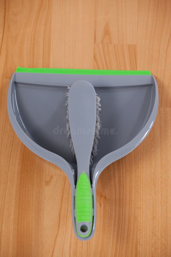 Dustpan and Sweeping Brush on Wooden Floor Stock Photo Image of