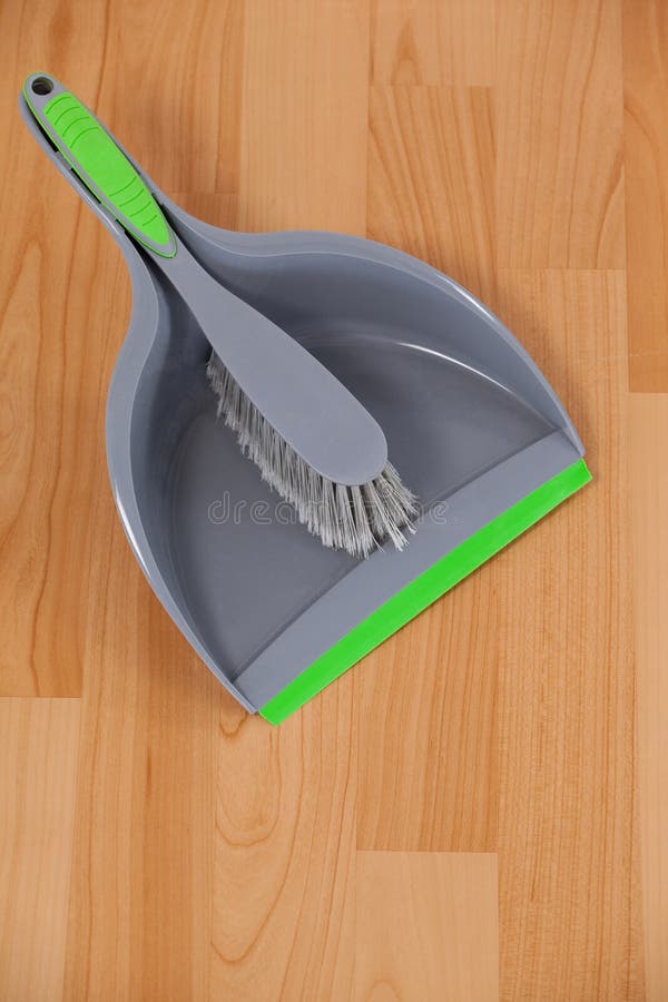 Dustpan and Sweeping Brush on Wooden Floor Stock Image Image of home