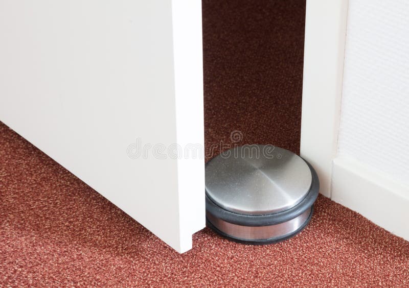 Dusty doorstop in a modern house royalty free stock image Dusty doorstop in a modern house royalty free stock image