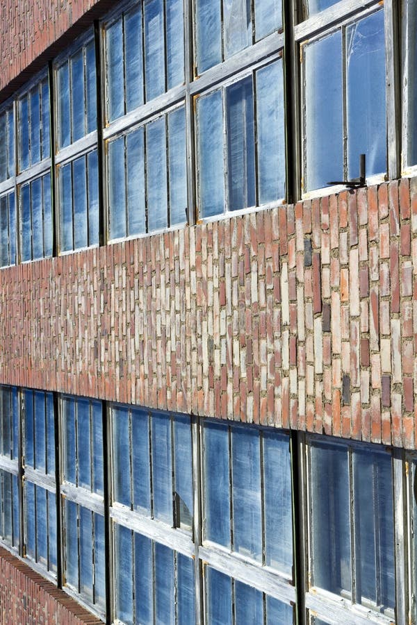 Dusty windows and brick wall